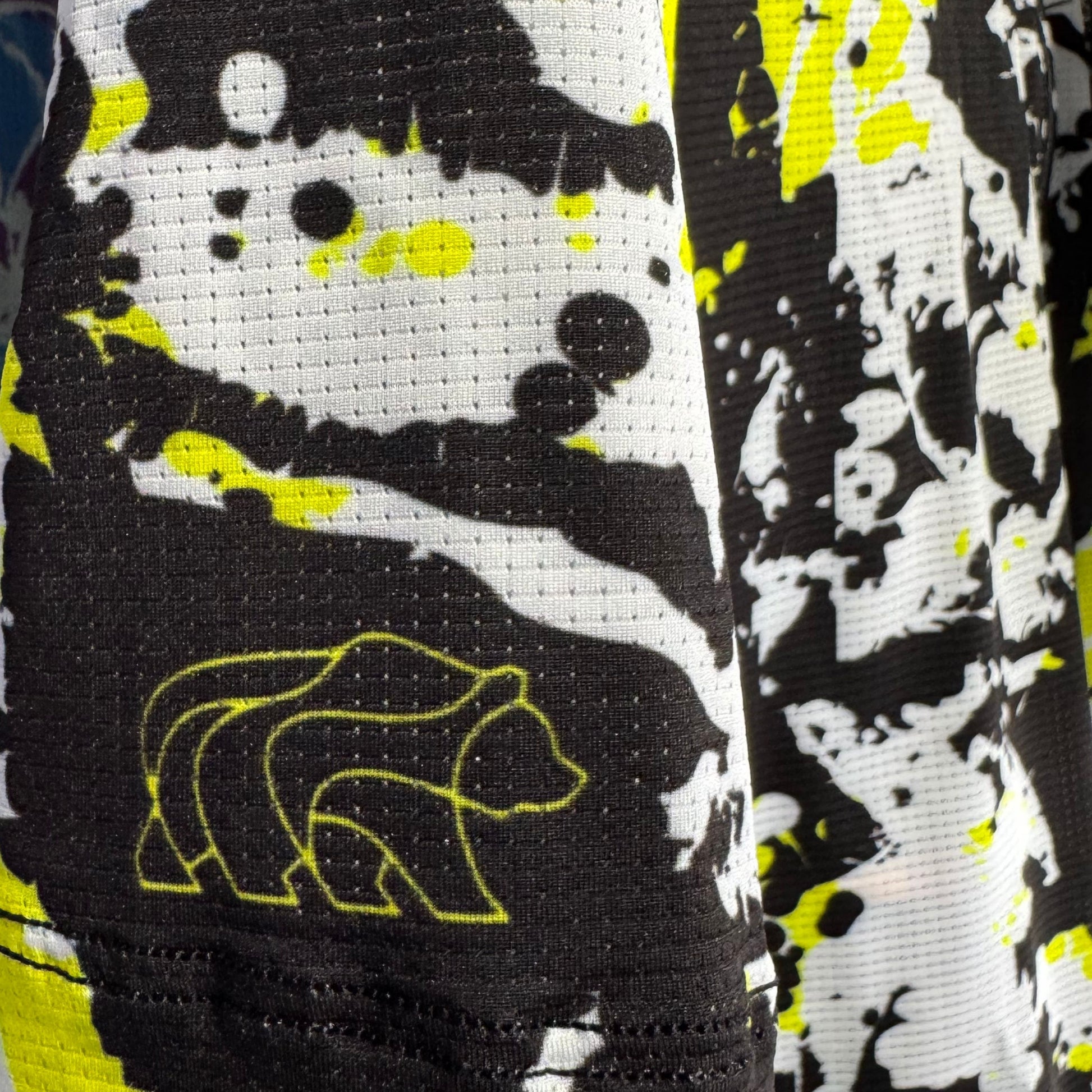 black, neon yellow, white jersey